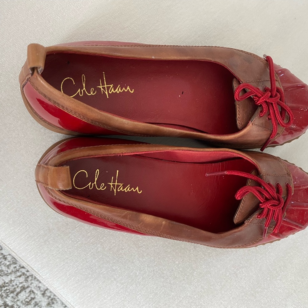 Cole Haan rain shoes in red and tan. Lightly worn. Size 8.